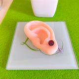 Arete acero inoxidable cristales morado