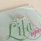 Aretes plata baño oro 14k ojo-127