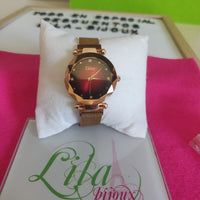 Reloj bronce rosado pulsa imán