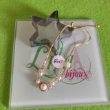 Pulsa fina en oro laminado con acero inoxidable Y perlas