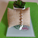 Pulsa fina en oro laminado con acero inoxidable Y perlas