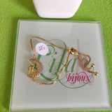 Pulsa fina en oro laminado con acero inoxidable
