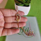 Pulsa fina en oro laminado con acero inoxidable