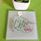 Pulsa fina en oro laminado con acero inoxidable