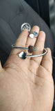 Pulsa Plateada corazón con anillo