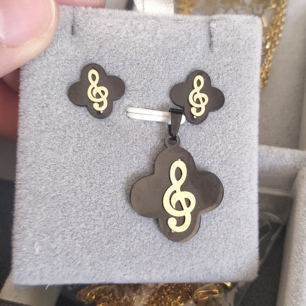 Set Medalla y arete musical negro con dorado - SET25