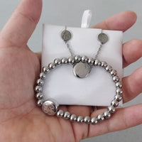 Set Cadena y aretes y pulsa tous plateado - SET35