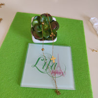 Tobillera dorada doble cruces