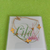 Tobillera dorada doble cruces