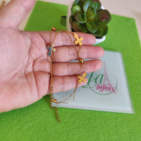 Tobillera dorada doble cruces